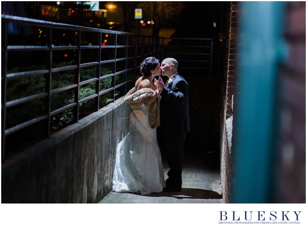 night images of bride and groom dramtic kissing
