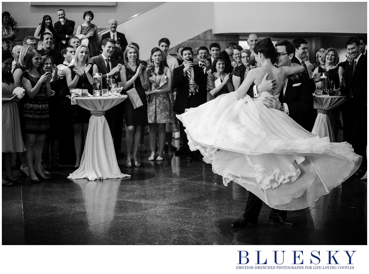 groom spins bride during first dance