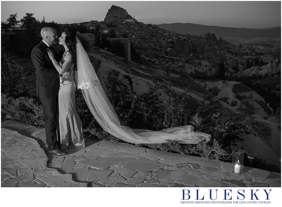 black and white image of couple kissing Argos Cappadocia Turkey wedding