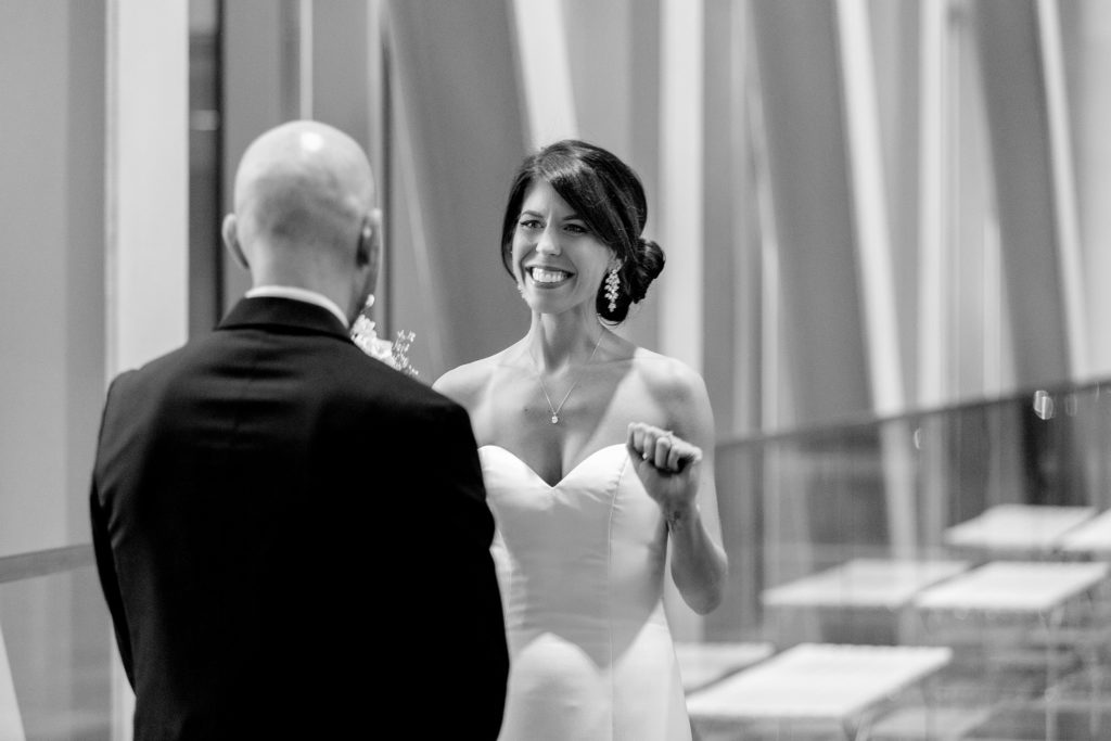 Emotional first look between bride and groom at Founders Hall, Charlotte NC