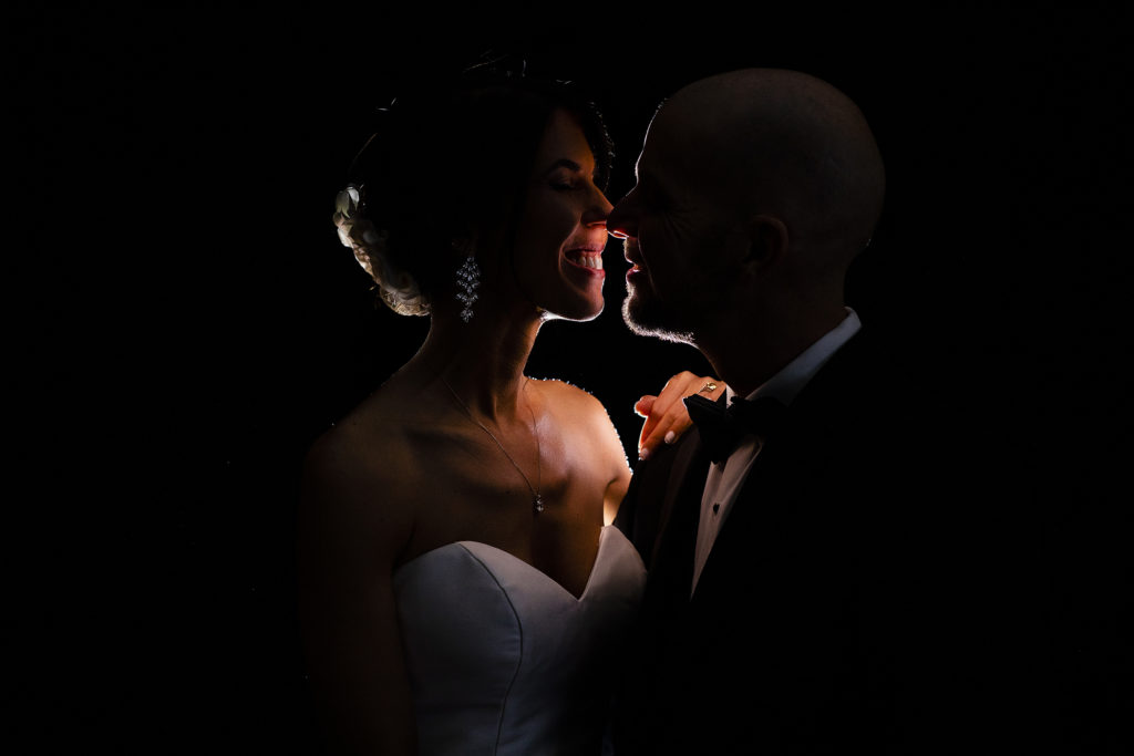 Epic, silhouette portrait of bride and groom at Founders Hall, Charlotte NC