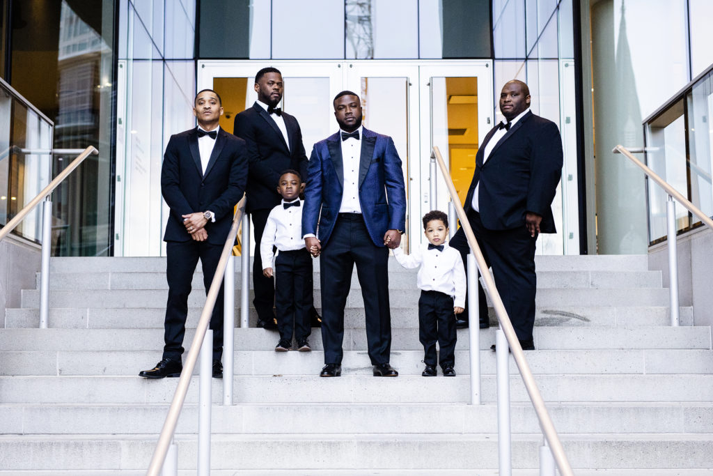 Groomsmen on the front steps at The Mint Museum Uptown Charlotte NC