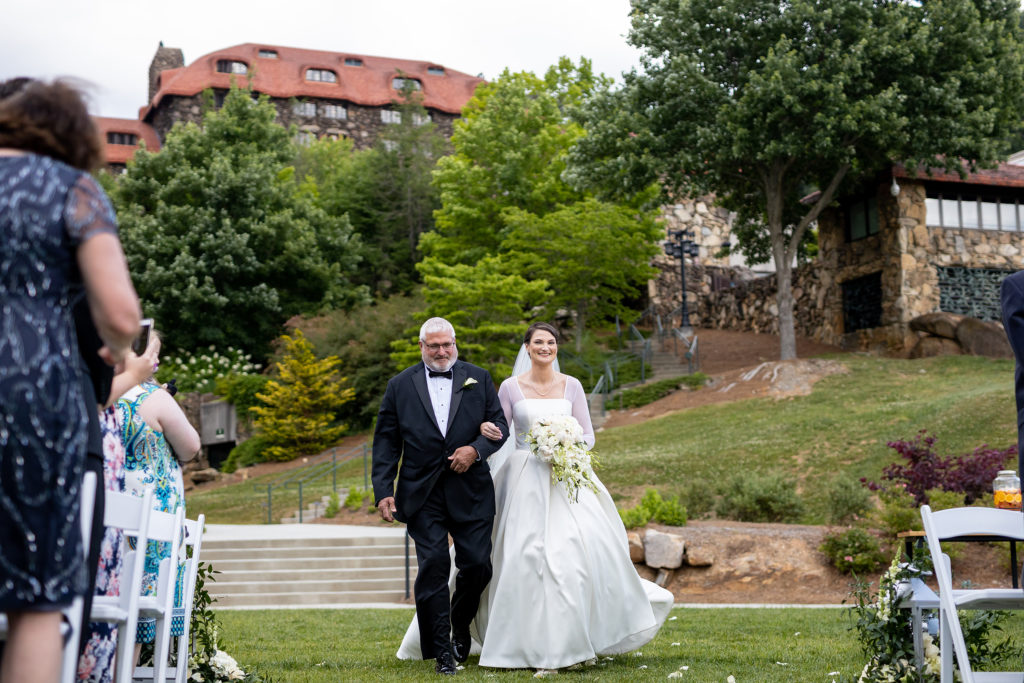 Bride and her dad walking down the isle - Wedding at Seely Pavilion Lawn in The Grove Park Inn in Asheville, NC