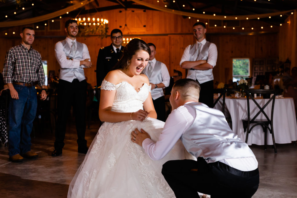 Garter removal, Winter Wood Farm in Sparta NC - Captured by Weddings by Bluesky